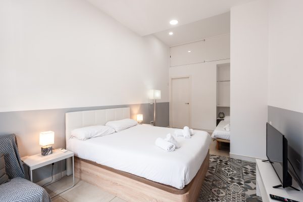 Dormitorio de apartamento destinado a alquiler turístico en Valencia